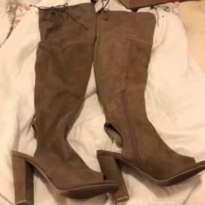 Over the knee heeled boots with tied top
